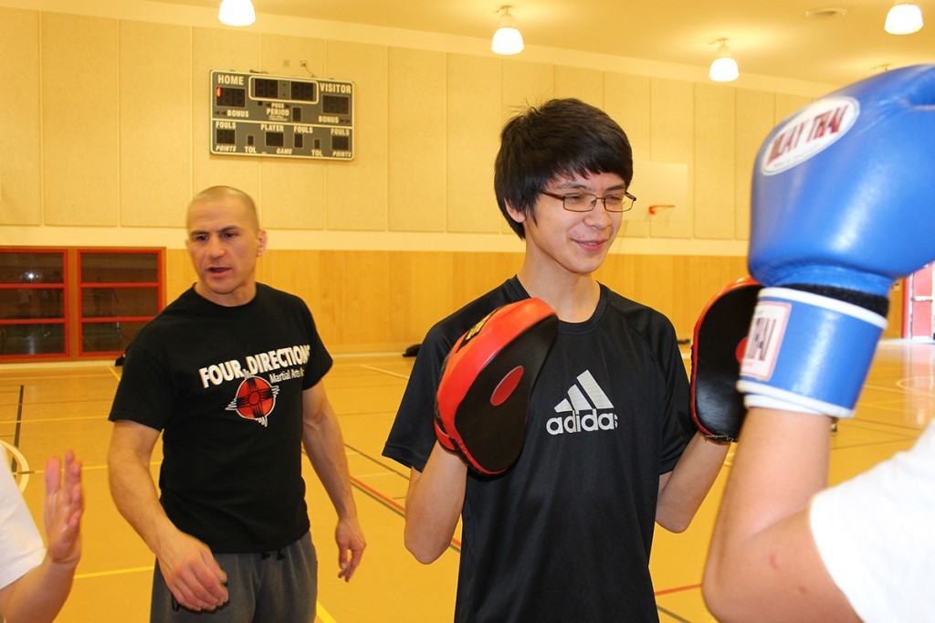 Students learn to throw jabs in Chawathil.