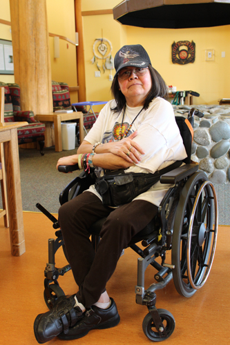 Bernice Williams sitting in the Sto:lo Elders Lodge common area.